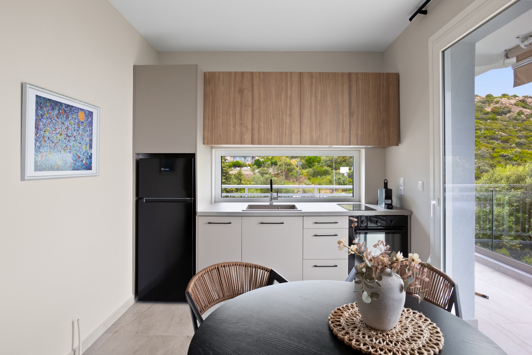 Kitchen and dining area photographed for property listing