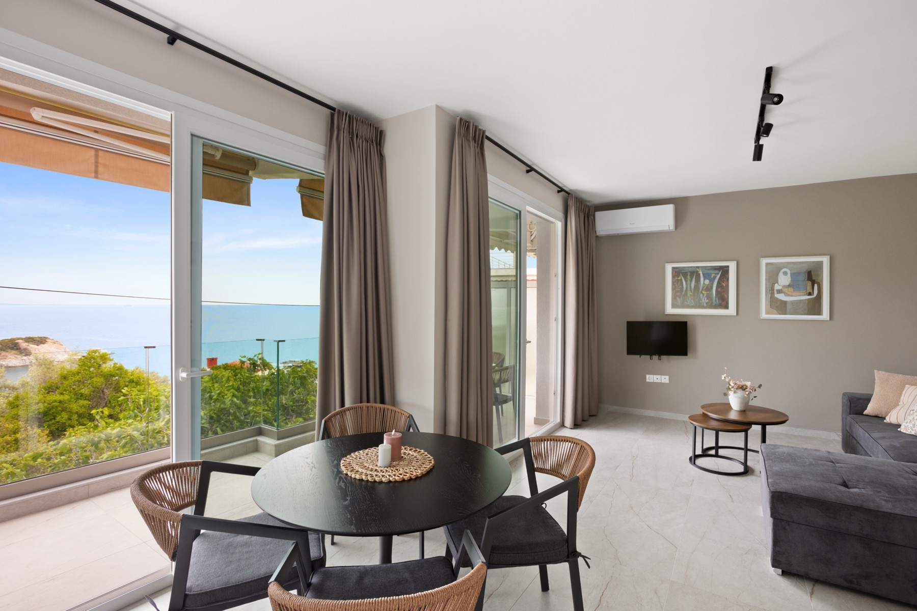 Bright living and dining area with sea view